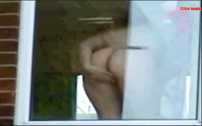 Neighbor showing her ass in the window